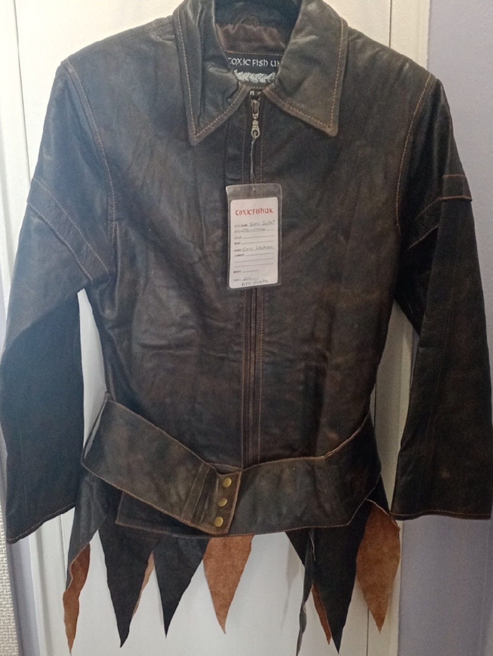 Women's Distressed Brown Leather Jacket with Belted Hem